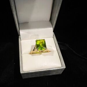 Elegant Gold Tone Ring with Green Peridot
